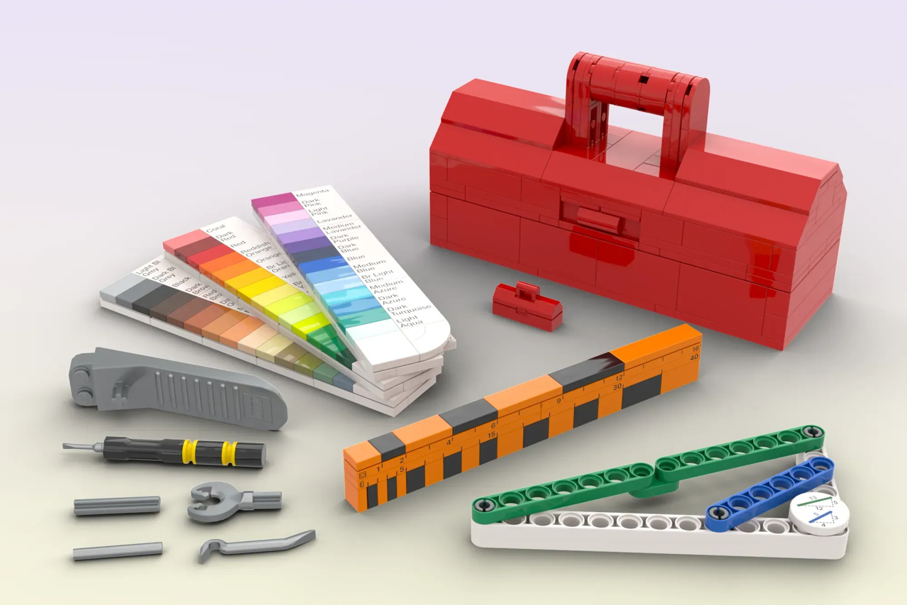Fan builder luc.afol designed an upscaled LEGO® toolbox filled with brick-themed tools.