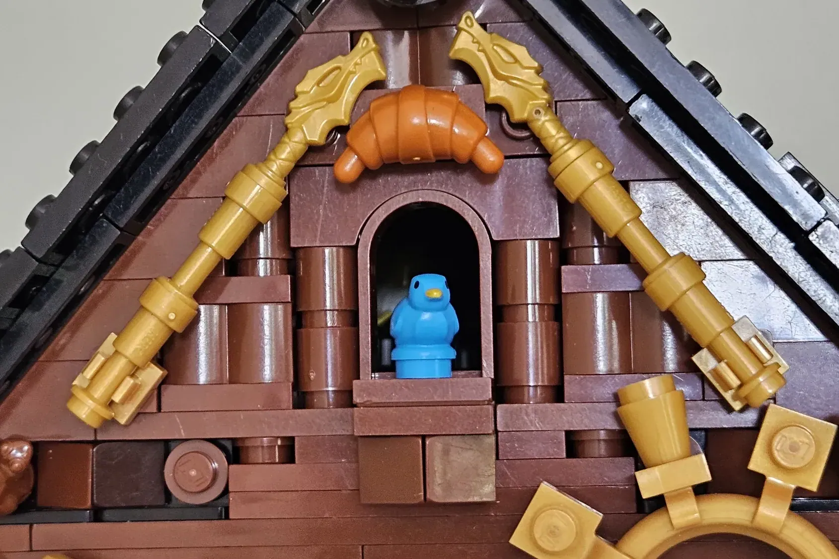 A fully functional LEGO® pendulum clock inspired by traditional cuckoo designs.