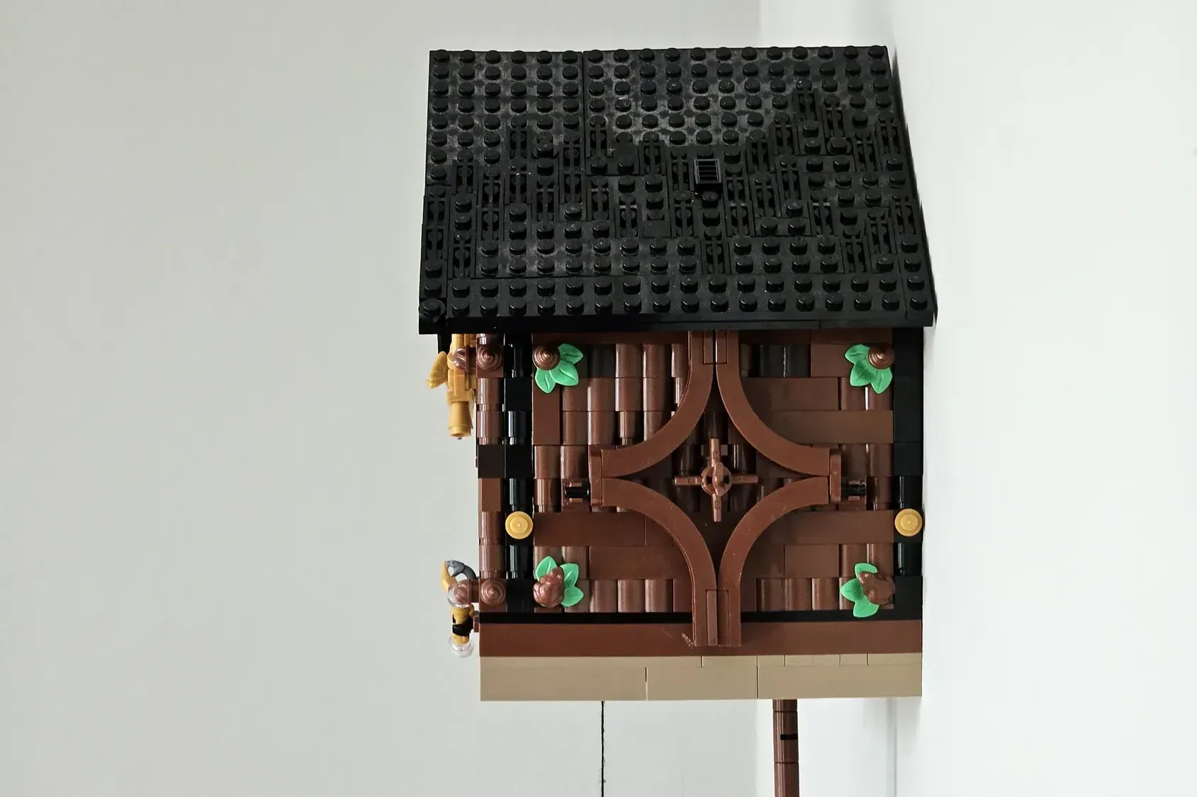 A fully functional LEGO® pendulum clock inspired by traditional cuckoo designs.