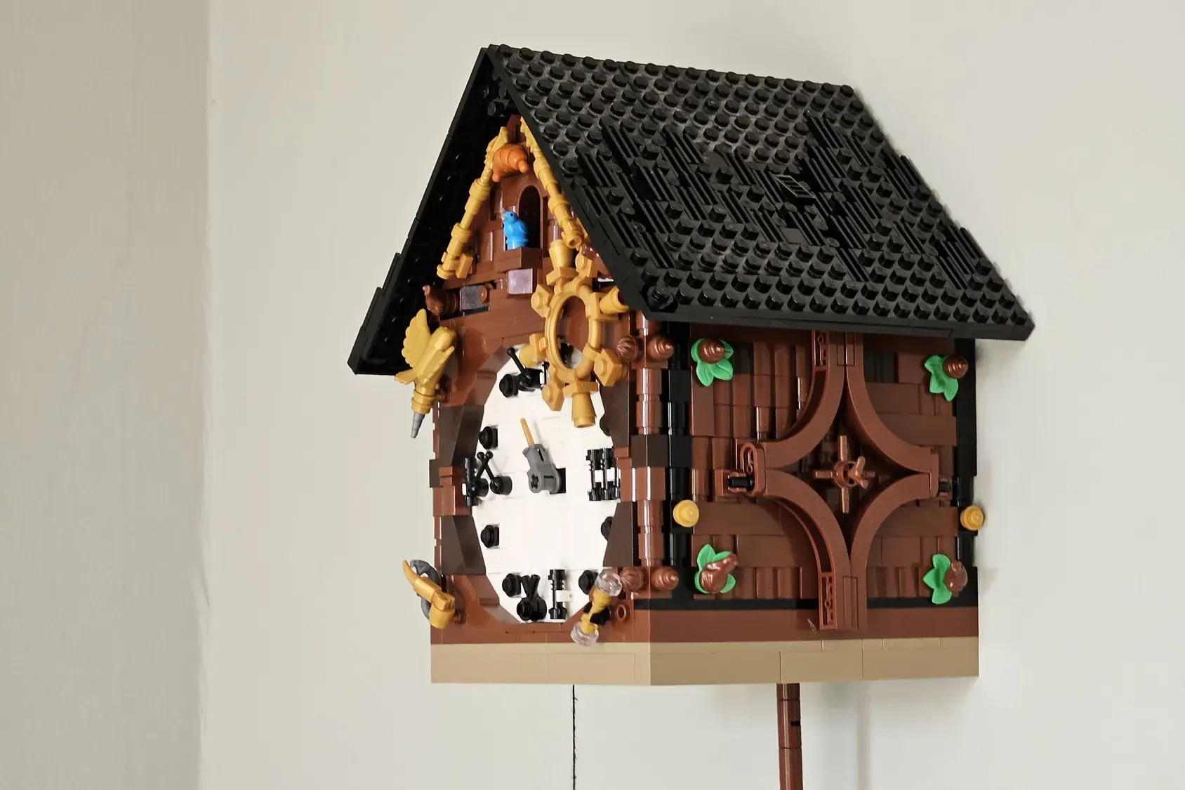 A fully functional LEGO® pendulum clock inspired by traditional cuckoo designs.