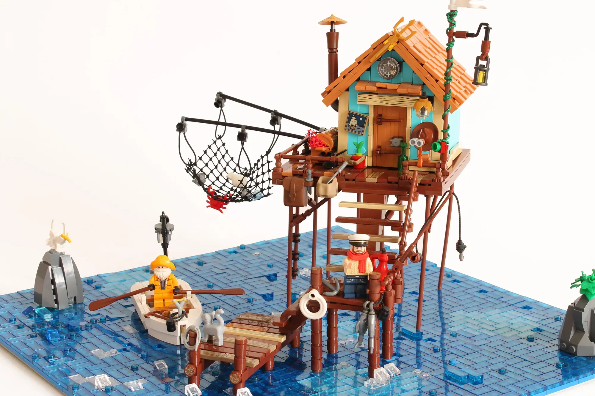 The creator of the LEGO® A-Frame Cabin (21338) returns with a new coastal masterpiece.  The Stilt House celebrates solitude, craftsmanship, and the poetry of the sea.