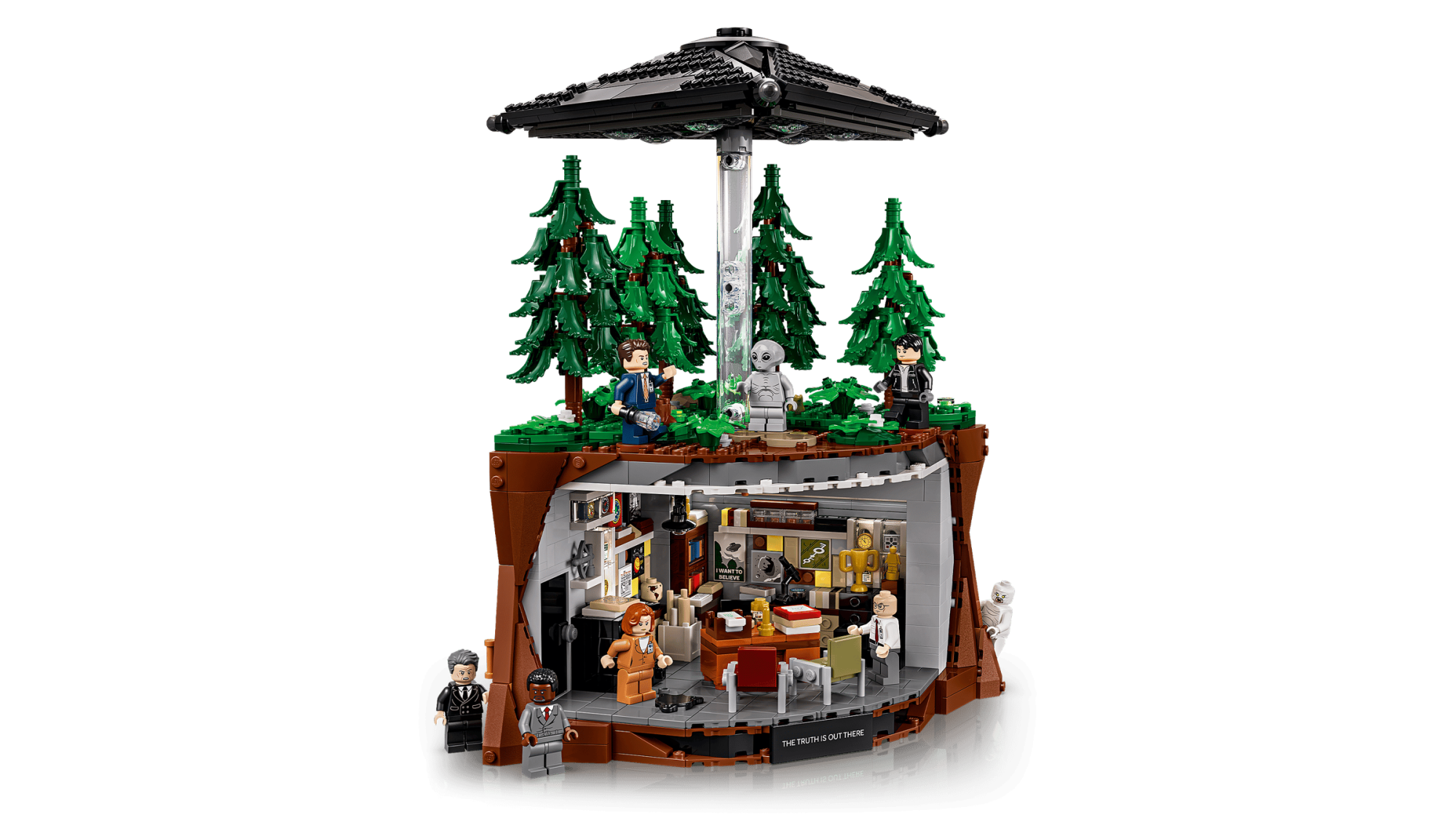 LEGO Ideas The X-Files Set 21369 featuring FBI office interior, forest scene with UFO, and minifigures including Mulder an…