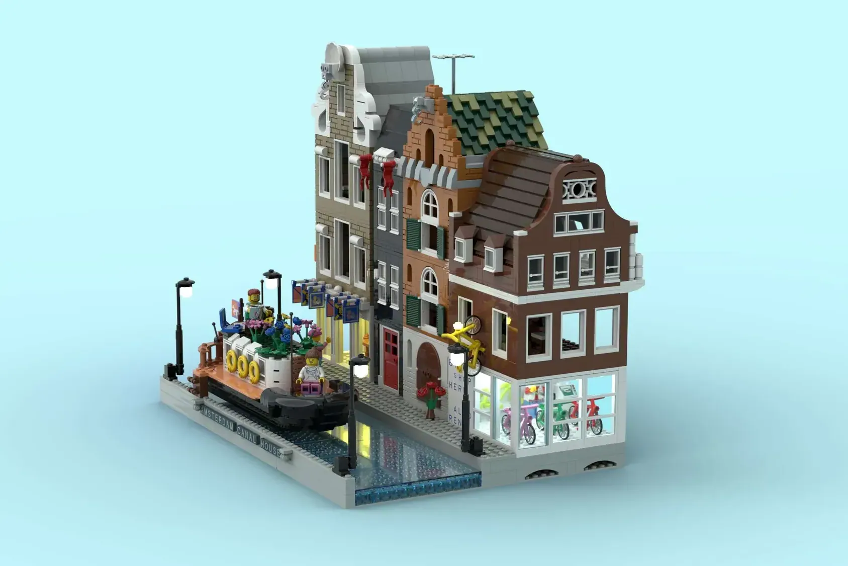 LEGO Amsterdam Canal Houses set with brick buildings, canal-side base, minifigures, and detailed architectural features.