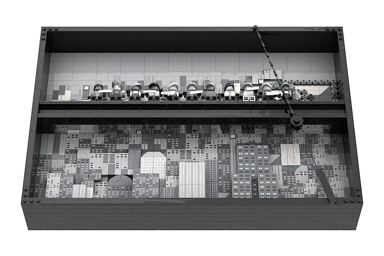 LEGO recreation of iconic cityscape with construction workers on top beam overlooking detailed buildings below.