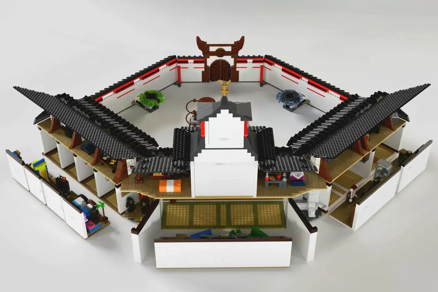 LEGO Ninjago Monastery with curved roofs, courtyard, decorative details, and multiple minifigure spaces.