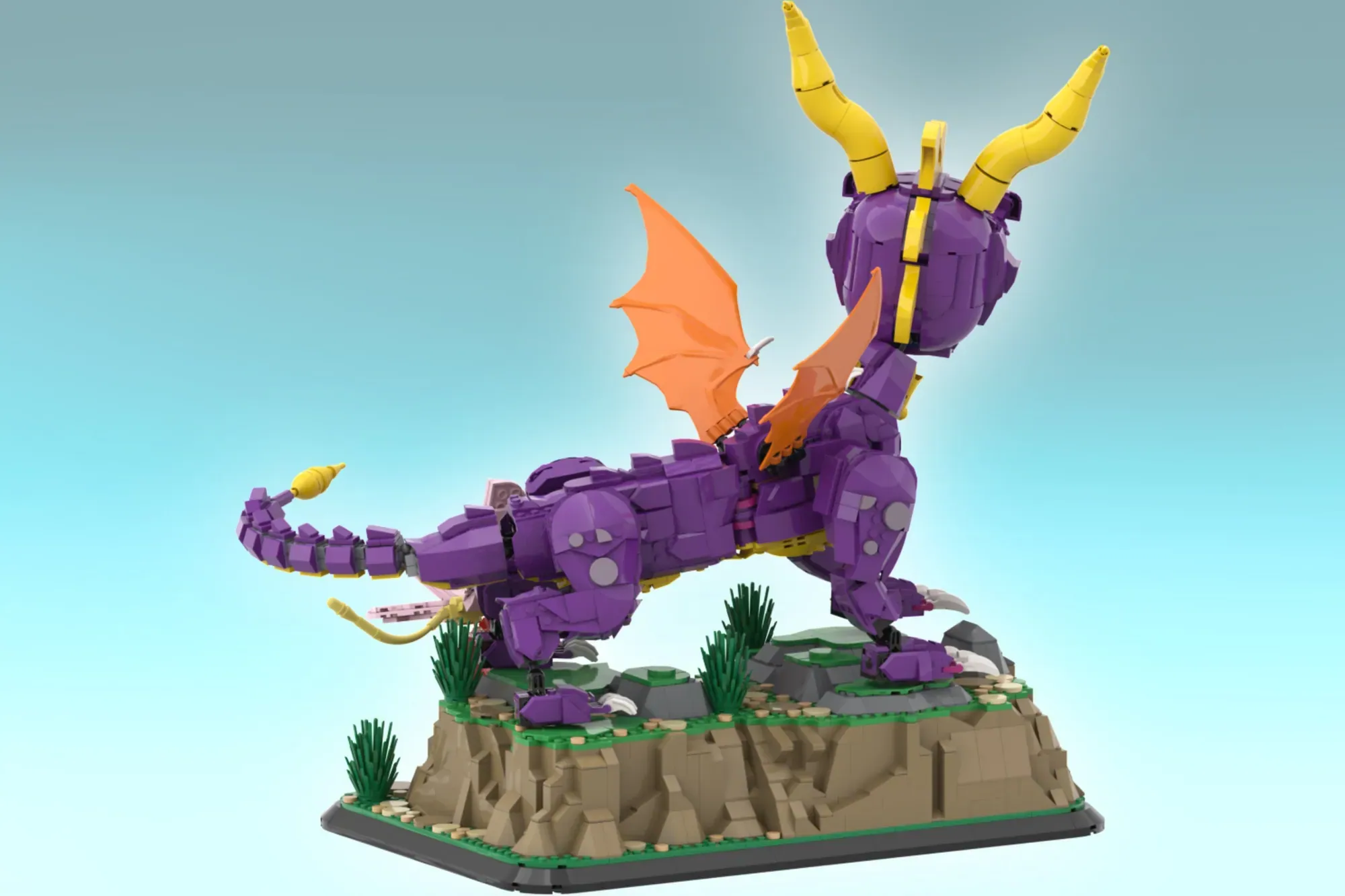 LEGO Spyro the Dragon set featuring purple dragon with yellow horns, orange wings, on rocky terrain base.