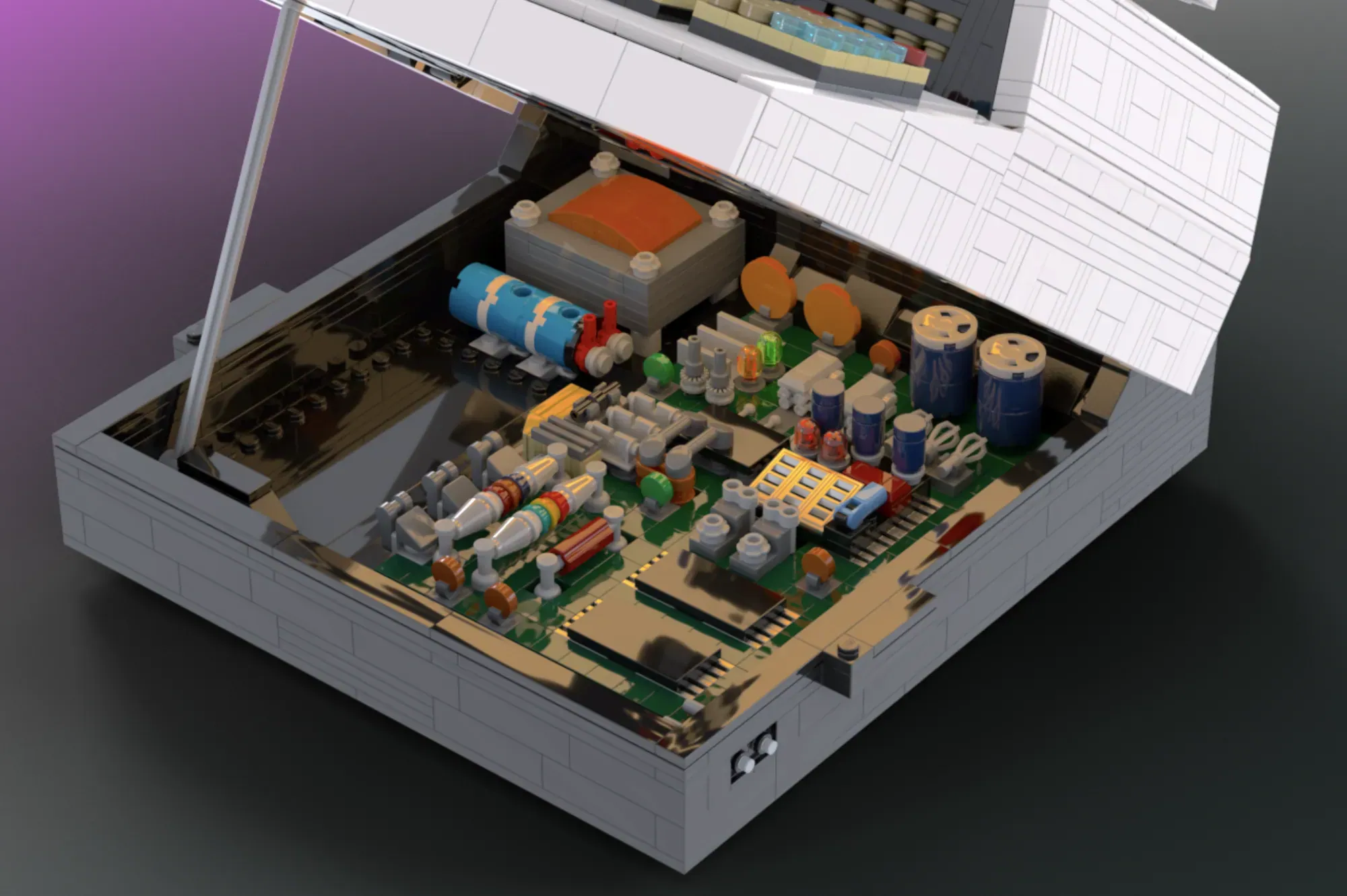 LEGO Commodore PET 2001 open with detailed motherboard interior featuring circuit boards and components.