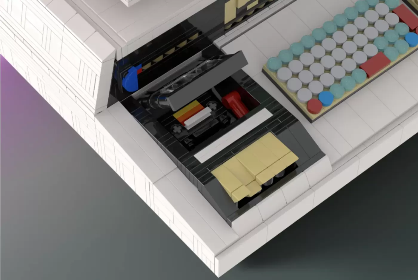 LEGO Commodore PET 2001 model with opening case revealing detailed brick-built motherboard interior.