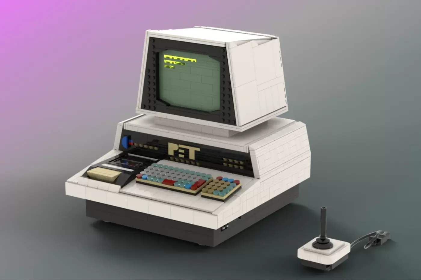 LEGO Commodore PET 2001 computer with opening case revealing brick motherboard and included joystick controller.