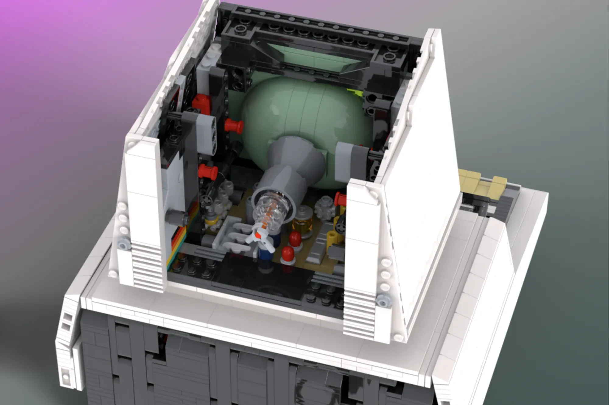 LEGO Commodore PET 2001 with opened top revealing green motherboard interior and minifigure components.